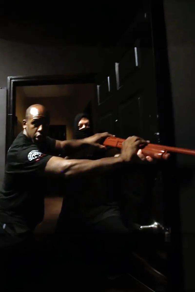 Adult Krav Pro student practicing a controlled defensive fundamentals drill.