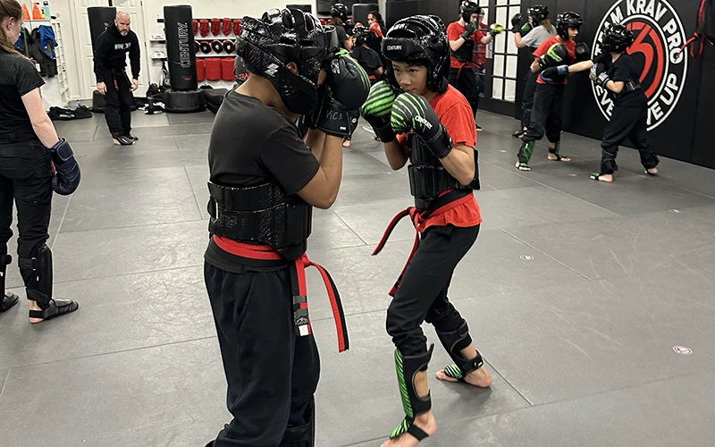 Teen students sparring during a Krav Pro self defense class