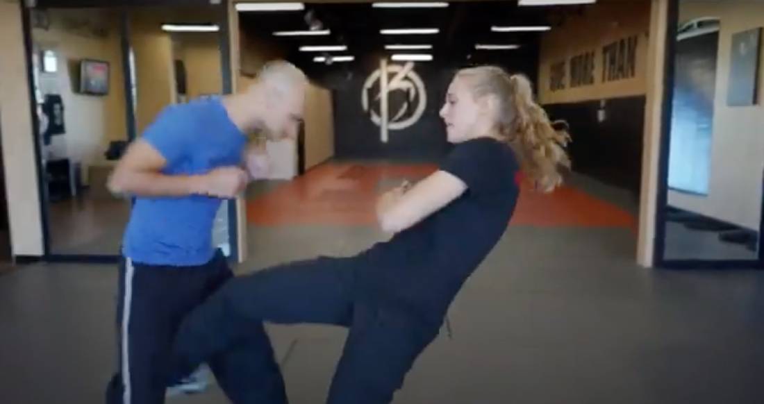martial arts instructor teaching a technique