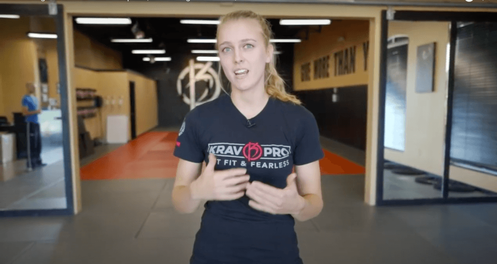 self defense instructor explaining a technique