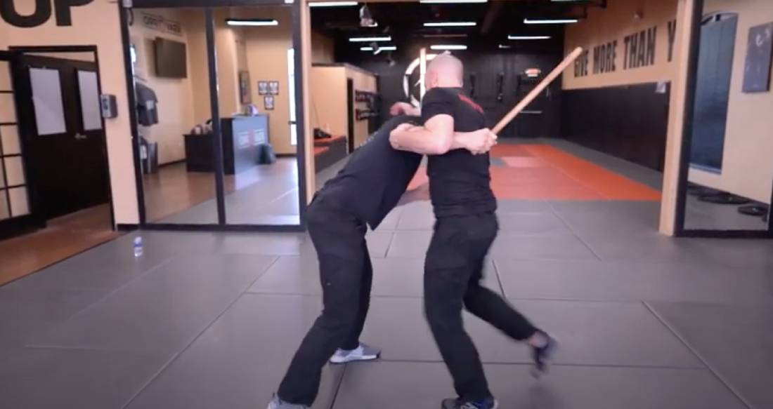 Martial arts instructor teaching a weapons defense In Duluth GA